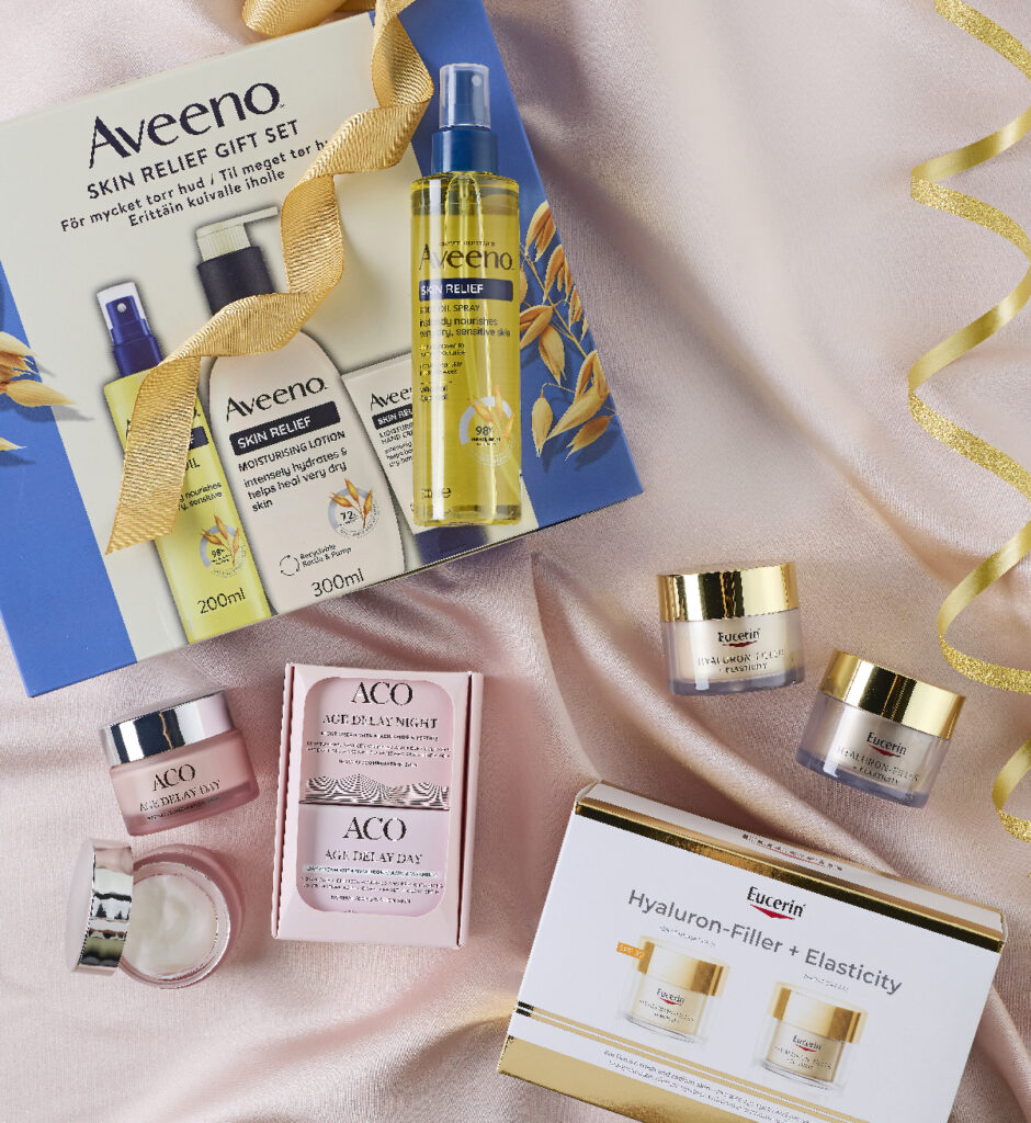 Joululahjat Avainapteekista: Kosmetiikan joululahjavinkit. Kuvassa Aveeno Skin Relief-lahjapakkaus ja Eucerin Hyaluron -Filler + Elasticity lahjapakkaus.